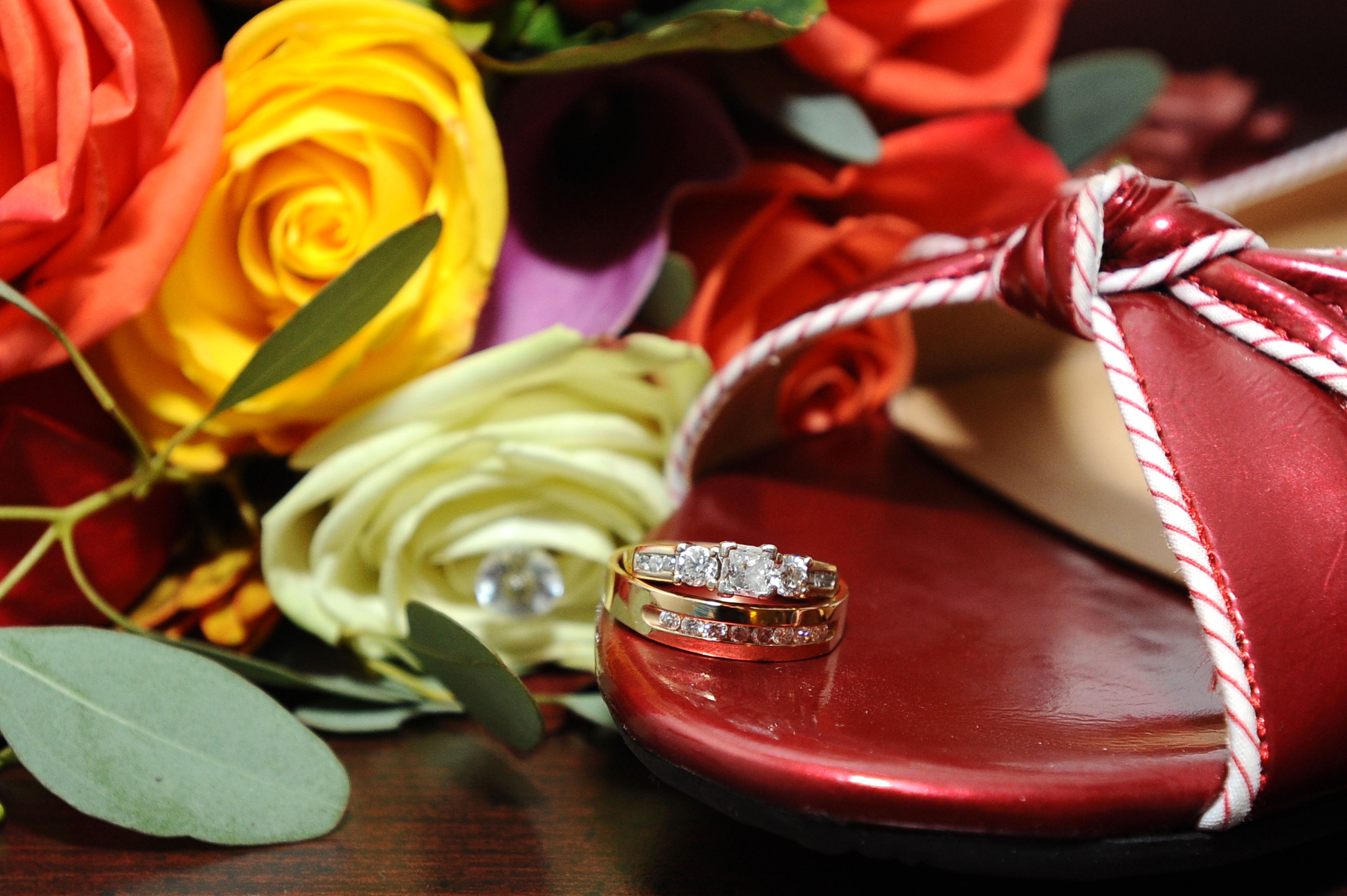 Wedding Ring high heels and Flowers at a wedding