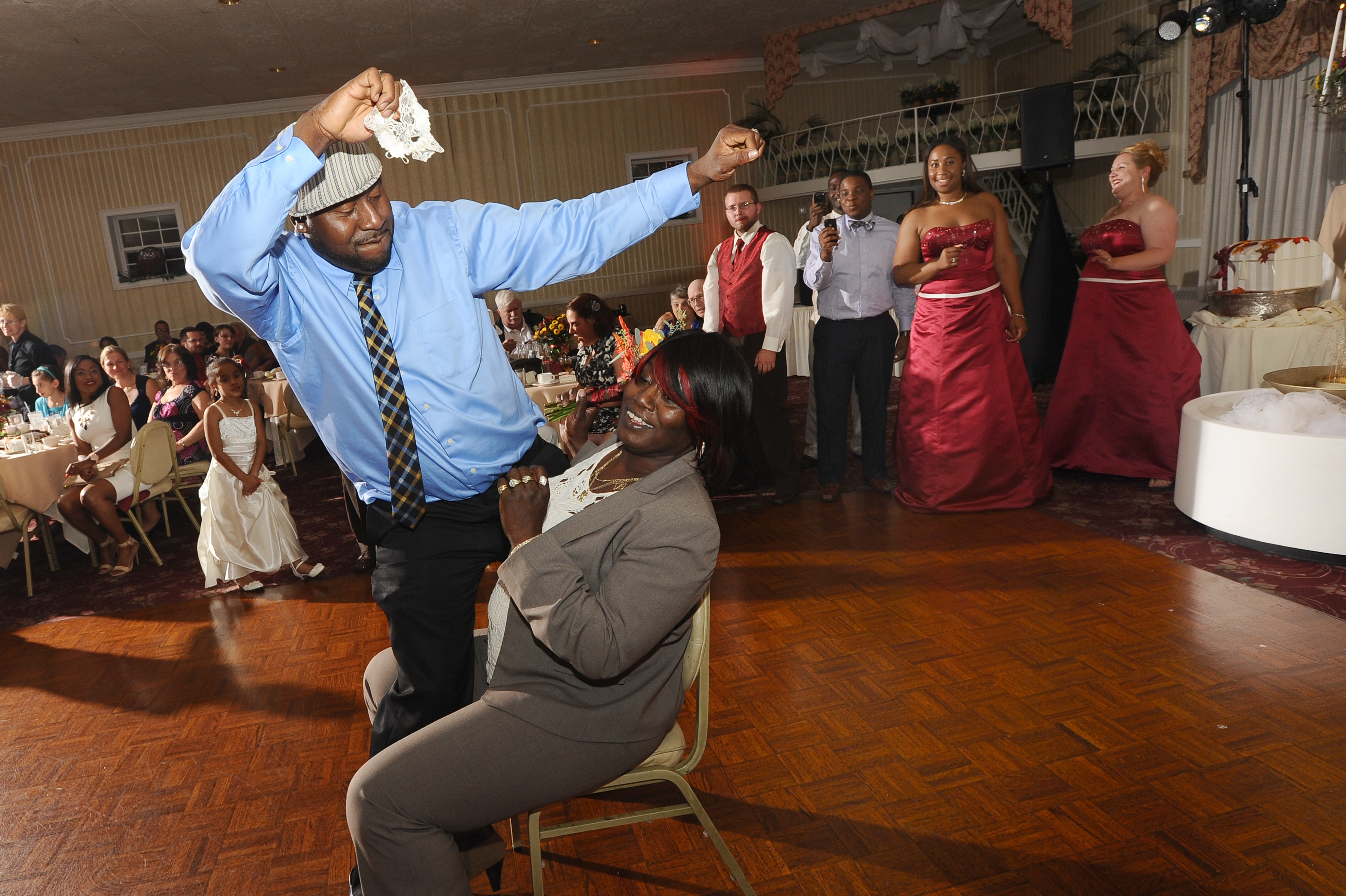 grabbing the garter at a wedding latham ny