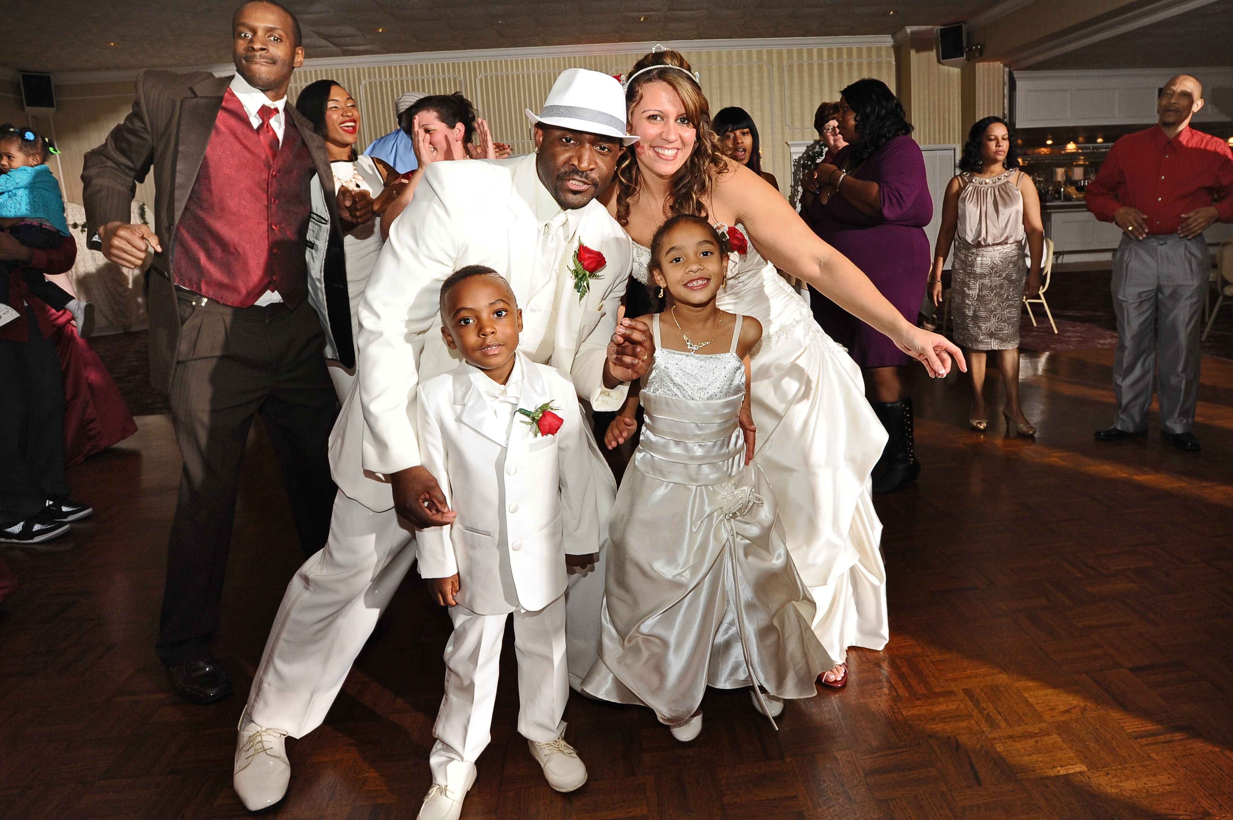 bride and groom and family on the dance floor at their wedding latham, ny