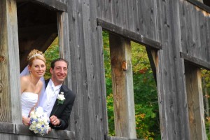 bride and groom posing at the colonie town park