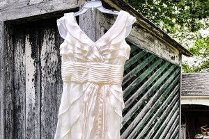 wedding dress hanging from a wooden outhouse Rensselaer NY