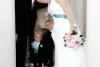 bride and groom stealing a kiss at the italian american center albany ny