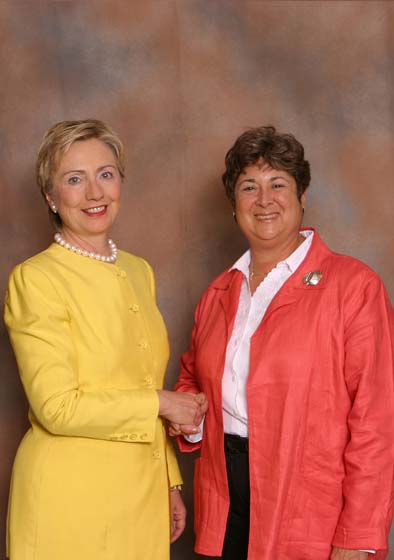 handshakes with hillary clinton at a non profit event