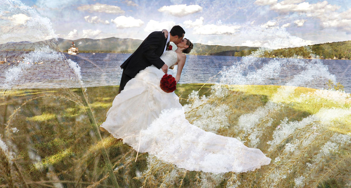 Bride and groom kissing at lake george ny