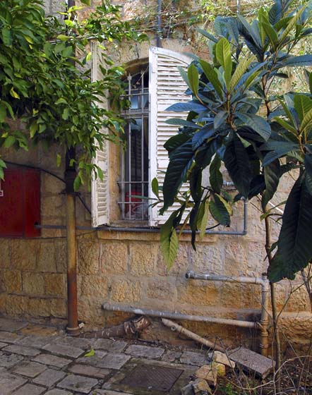 photo of white shutters on a synagogue in israel