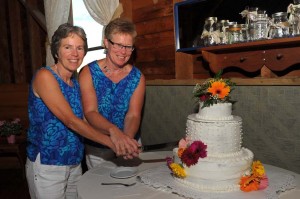 same sex brides cake cutting at the old tater barn schoharie ny