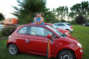 brides kissing through their VW beetle at the old tater barn schoharie ny