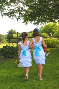 same sex wedding photo of the flower girls at old tater barn schoharie ny